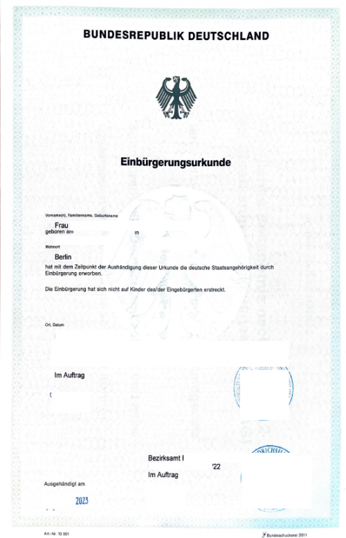Einbürgerungsurkunde DE > ES Berlin mit Rückseite